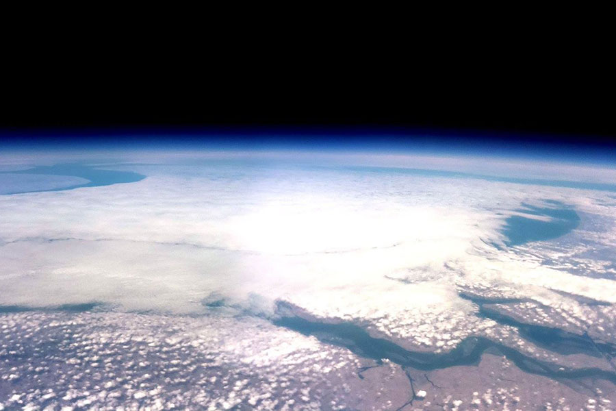 Asgard-X Cover Image - Satellite image of the Earth.