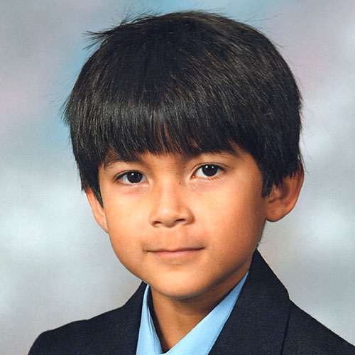 Yuki's school photograph at 13.