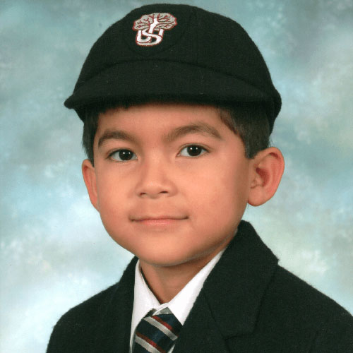 Yuki's school photograph at 7.